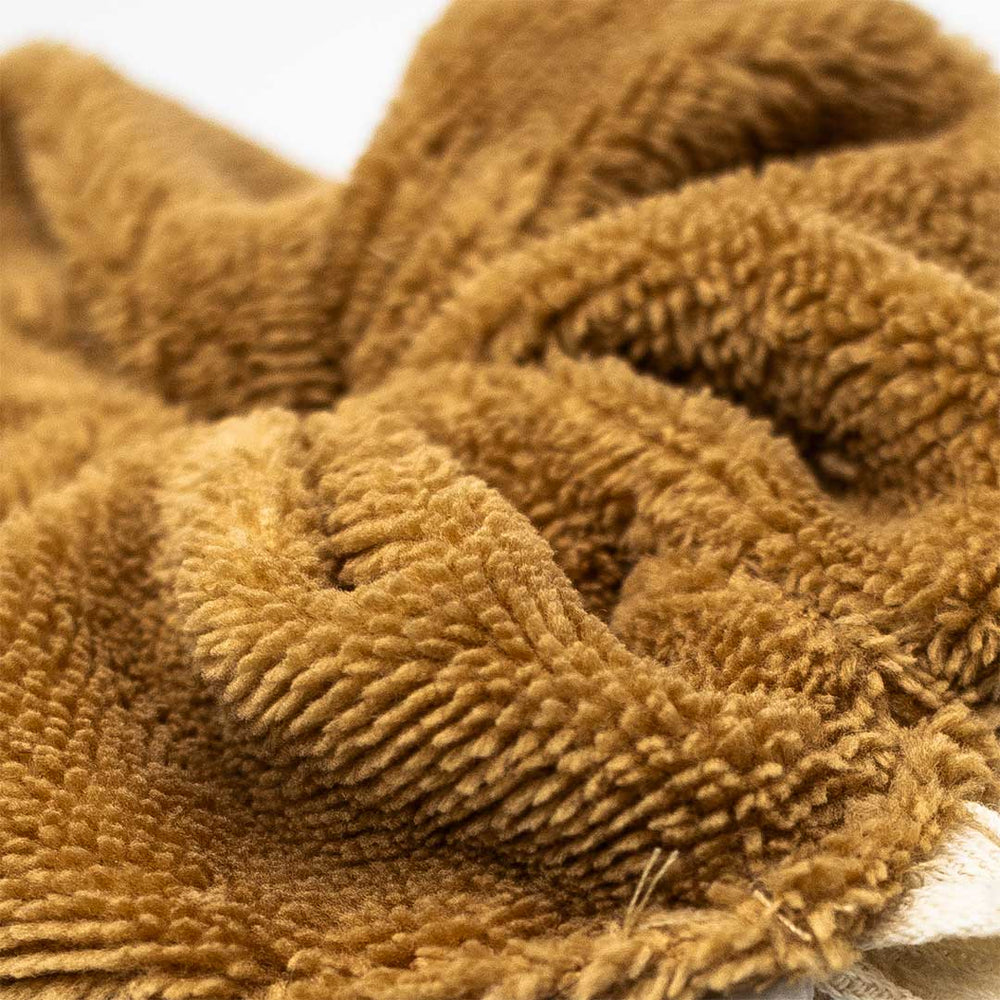 Fleur de douche lavable en coton jaune moutarde avec un cordon pour la suspendre 